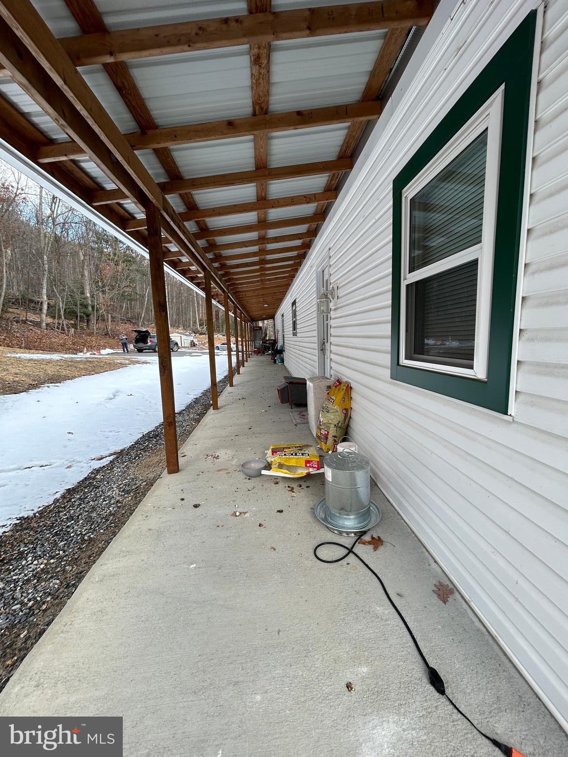 4743-4745 Chambersburg Road Biglerville, PA 17307 - Photo 6 of 101 a view of a porch with a bench