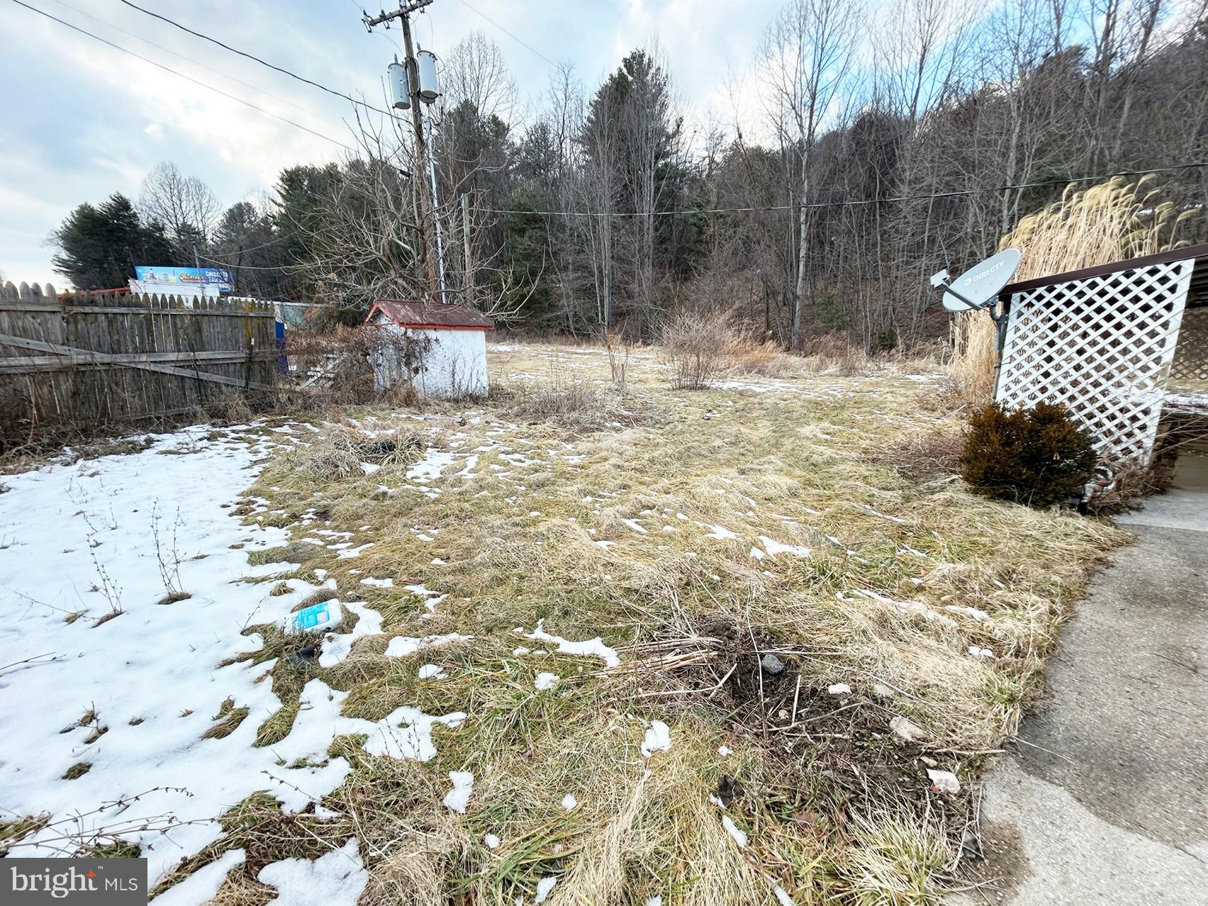 4743-4745 Chambersburg Road Biglerville, PA 17307 - Photo 65 of 101 a backyard of a house with lots of green space