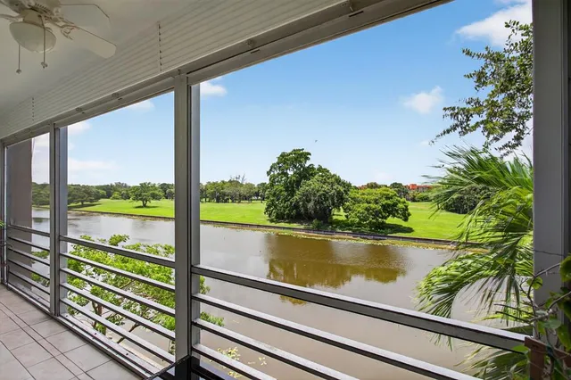 a view of a lake from a balcony