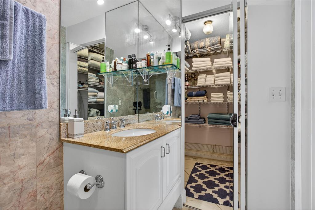 3551 Inverrary Drive, Unit 312 Lauderhill, FL 33319 - Photo 27 of 42 a bathroom with a sink and a mirror