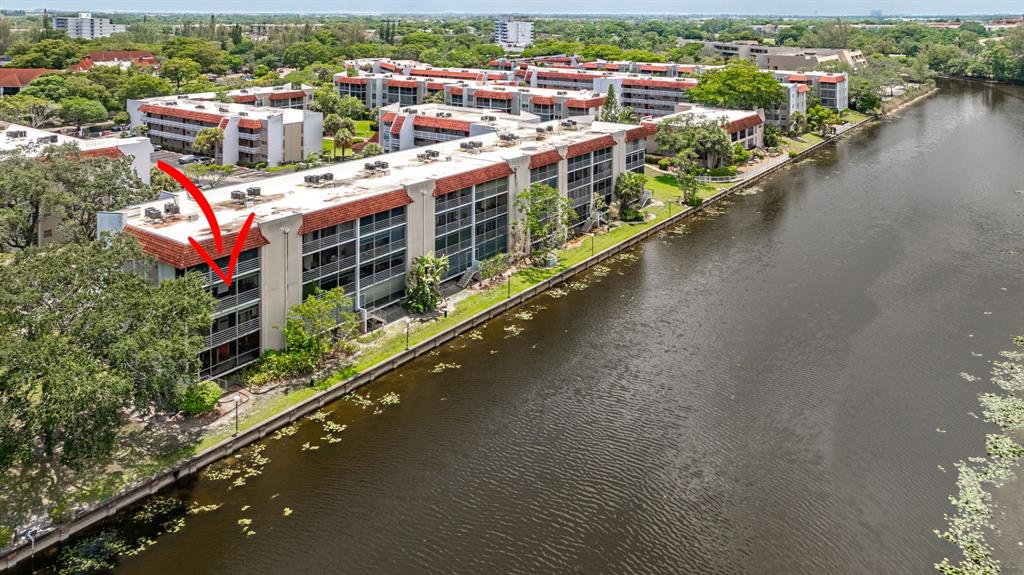 3551 Inverrary Drive, Unit 312 Lauderhill, FL 33319 - Photo 36 of 42 a city view from a balcony with city view