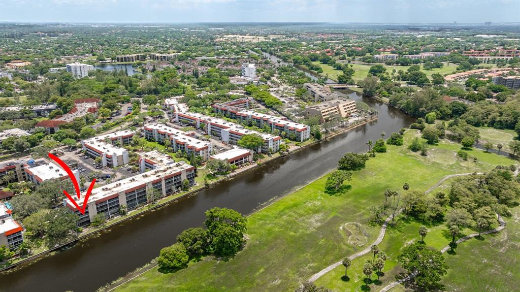 3551 Inverrary Drive, Unit 312 Lauderhill, FL 33319 - Photo 37 of 42 an aerial view of residential houses with outdoor space and swimming pool