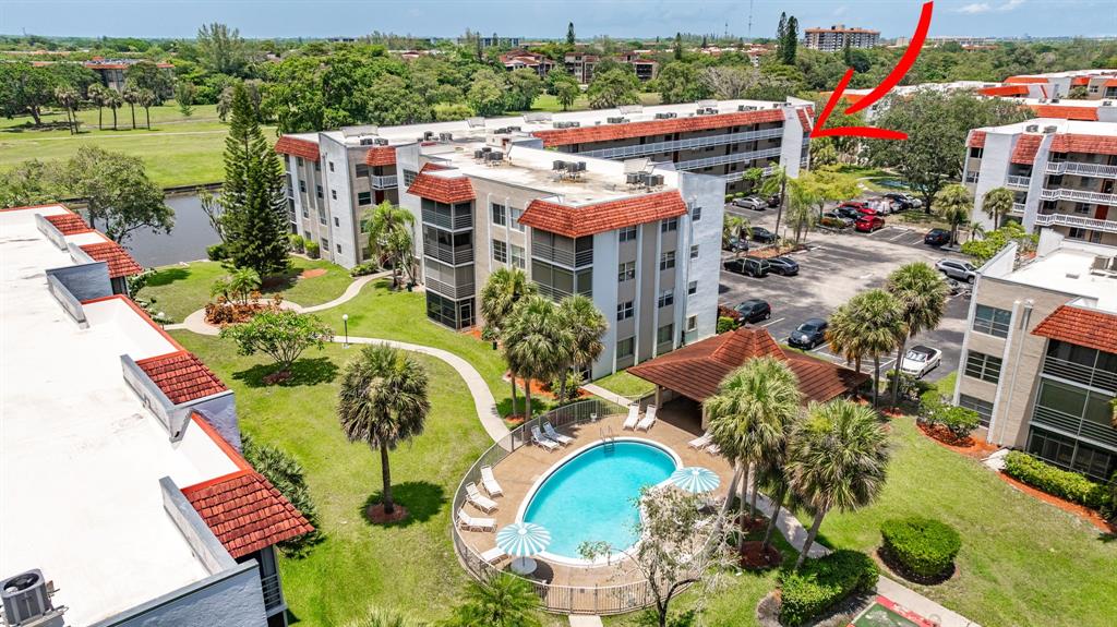 3551 Inverrary Drive, Unit 312 Lauderhill, FL 33319 - Photo 39 of 42 an aerial view of a house with outdoor space and a lake view
