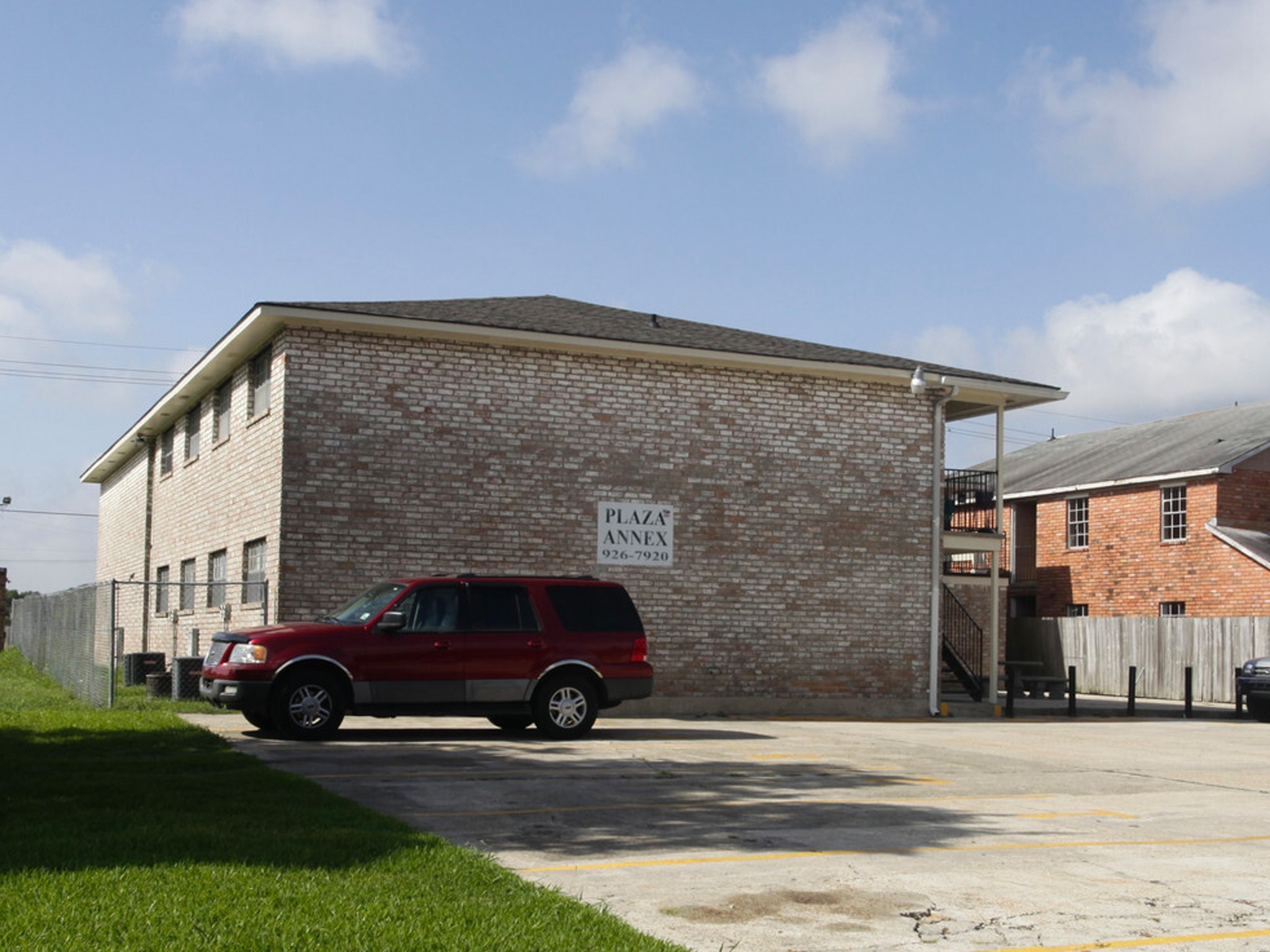6752 Titian Avenue, Unit 50 Baton Rouge, LA 70806 - Photo 2 of 6 a view of street with parked cars