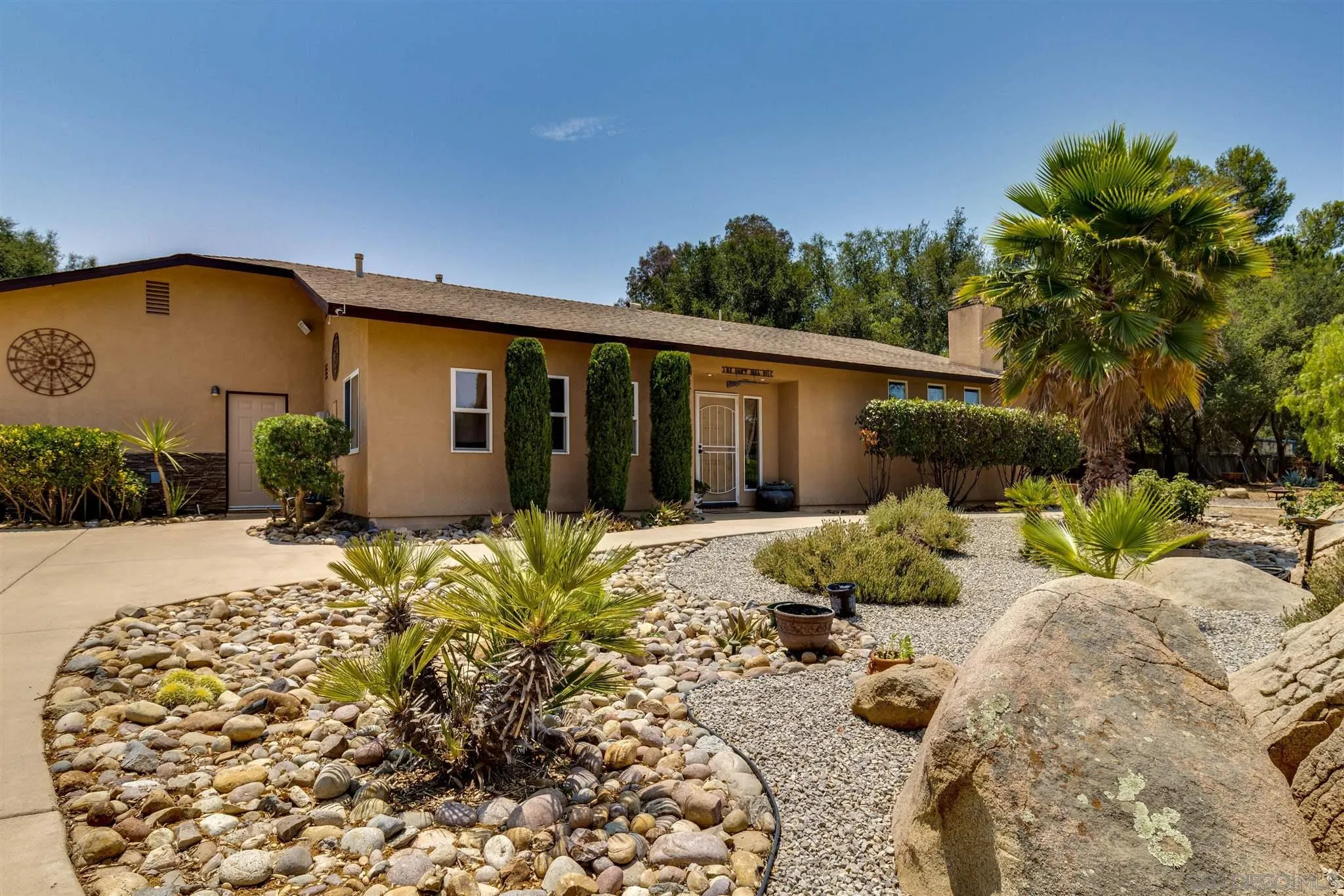 19139 Split Rock Road Ramona, CA 92065 - Photo 1 of 29 a front view of a house with a yard