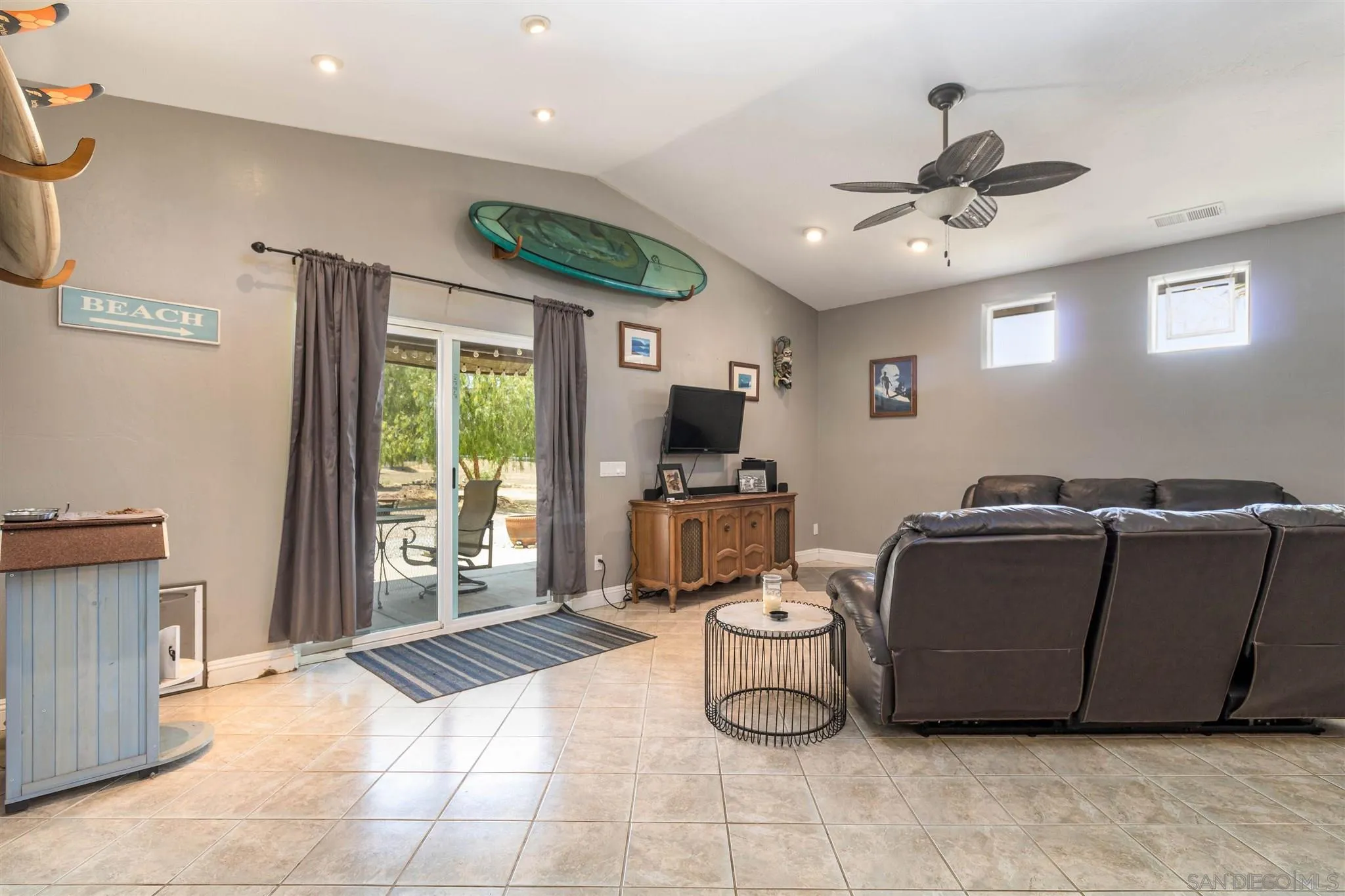 19139 Split Rock Road Ramona, CA 92065 - Photo 11 of 29 a living room with furniture and a flat screen tv