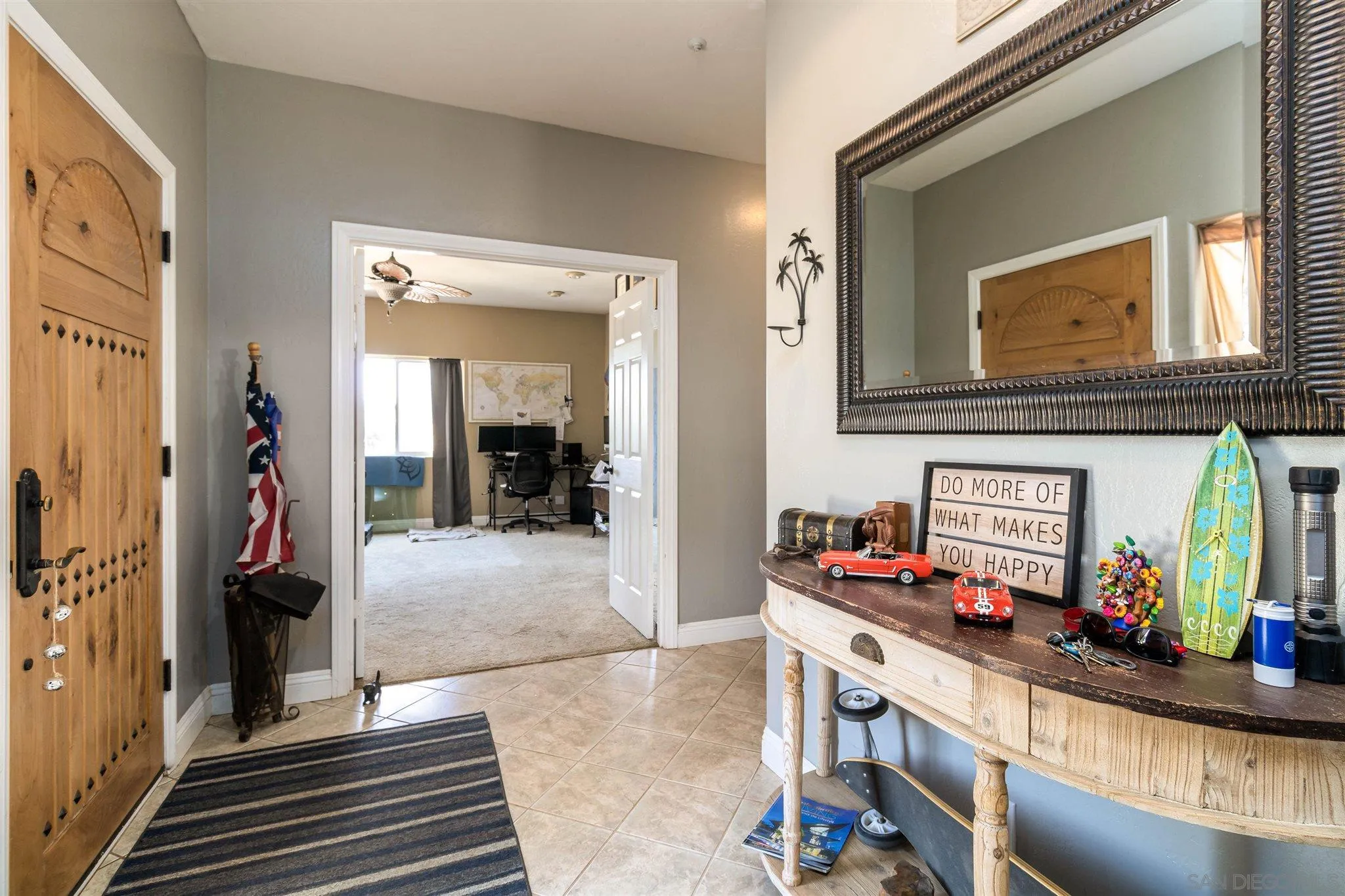 19139 Split Rock Road Ramona, CA 92065 - Photo 12 of 29 a living room with furniture and a flat screen tv