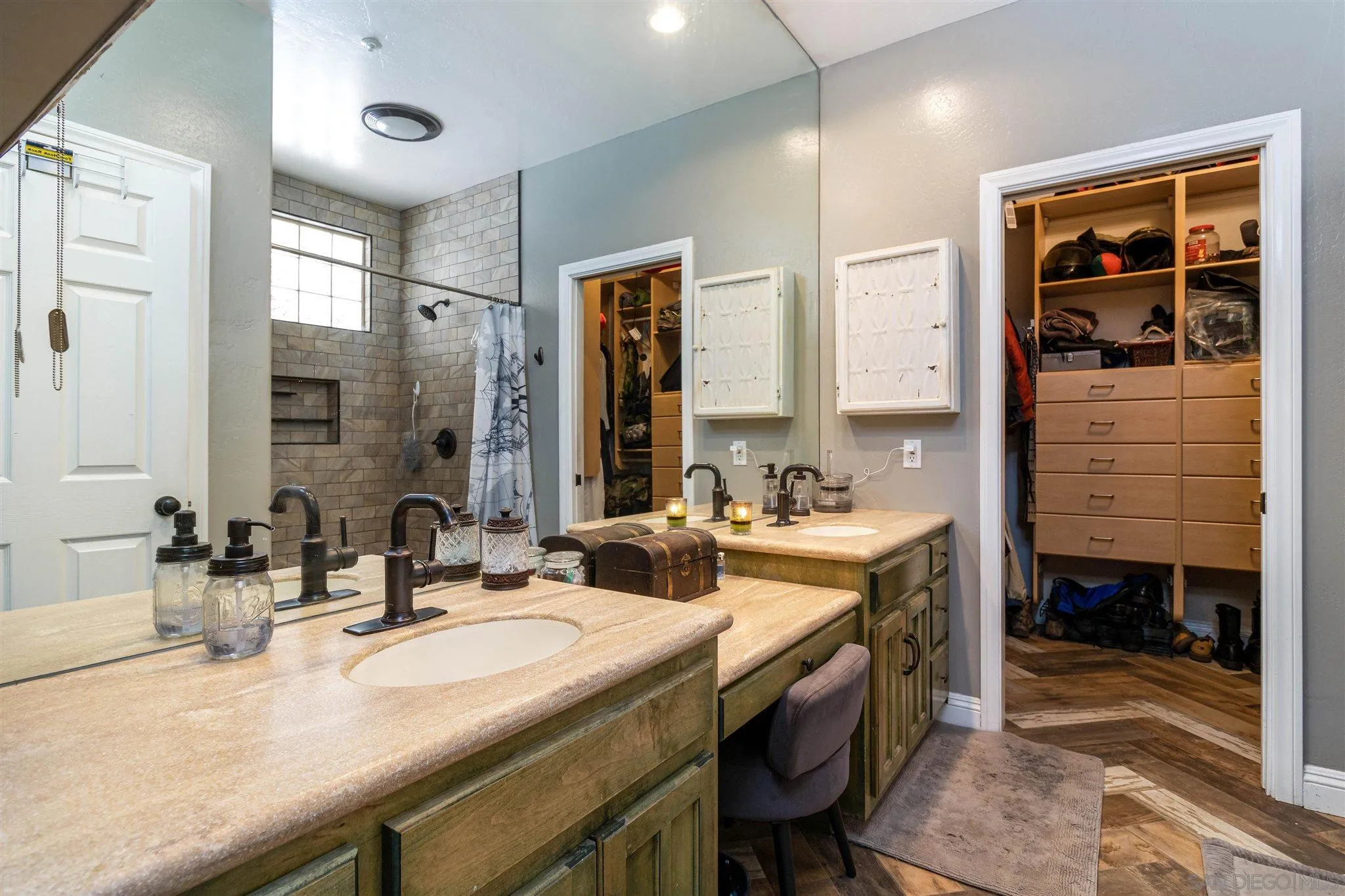 19139 Split Rock Road Ramona, CA 92065 - Photo 15 of 29 a bathroom with a sink double vanity and a mirror