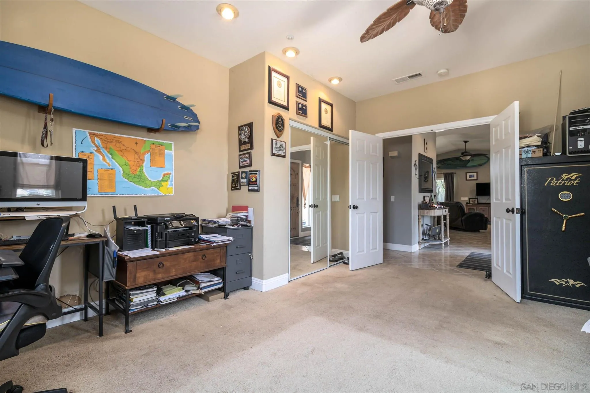 19139 Split Rock Road Ramona, CA 92065 - Photo 17 of 29 a living room with furniture gym equipment and a window