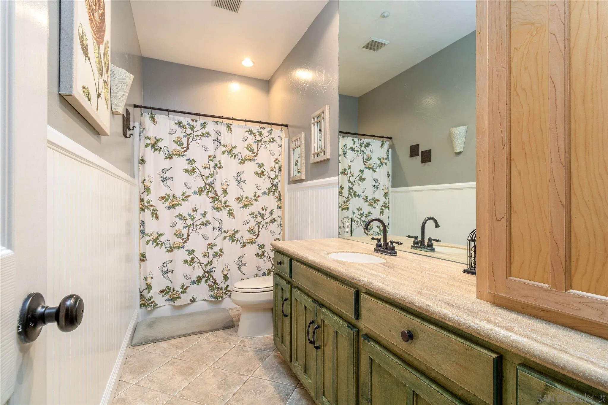 19139 Split Rock Road Ramona, CA 92065 - Photo 19 of 29 a bathroom with a sink toilet and shower