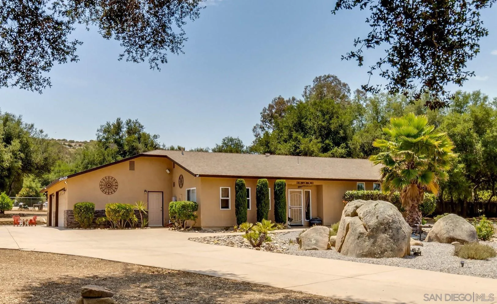 19139 Split Rock Road Ramona, CA 92065 - Photo 2 of 29 a front view of a house with a yard