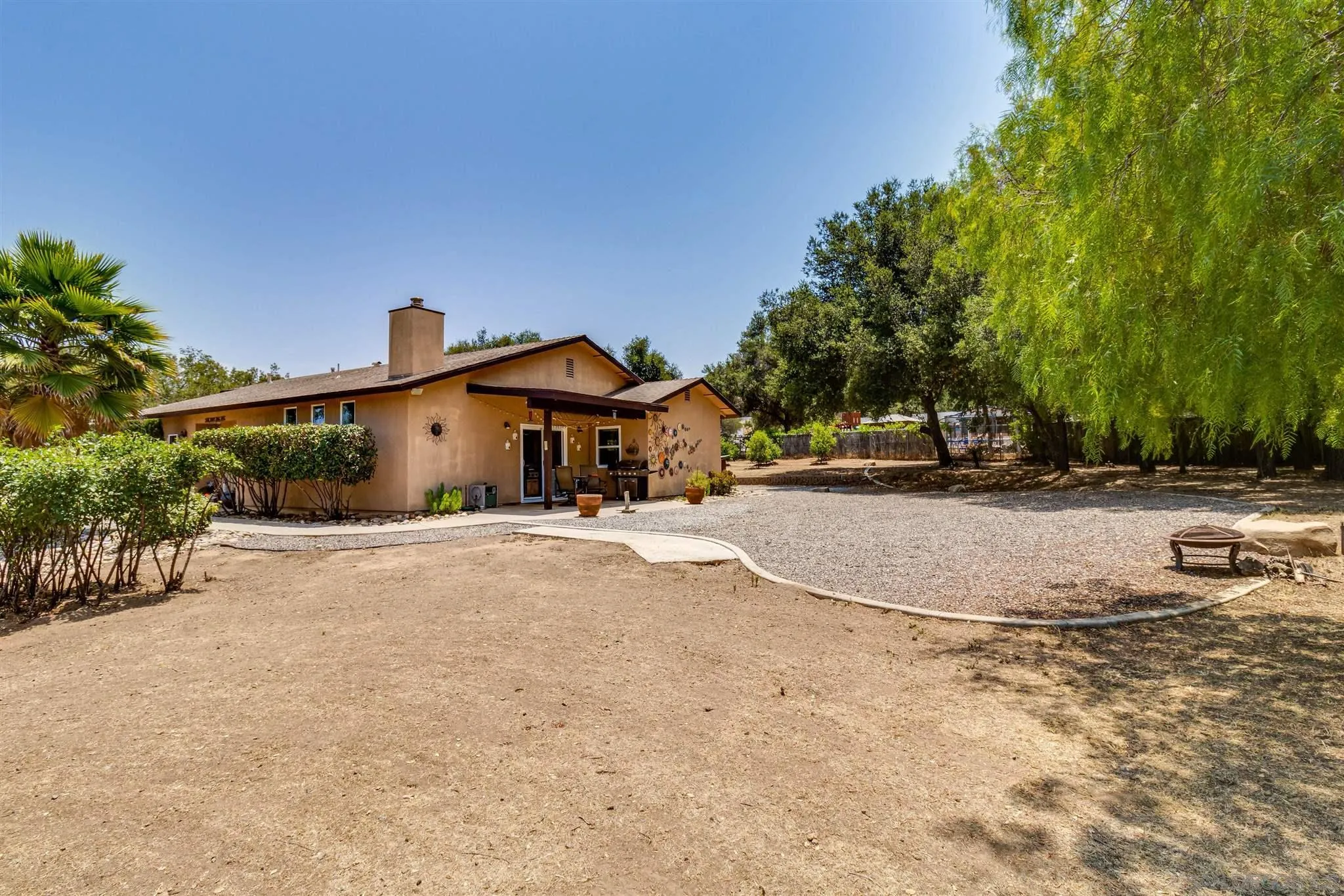 19139 Split Rock Road Ramona, CA 92065 - Photo 4 of 29 a view of a road with a building in the background