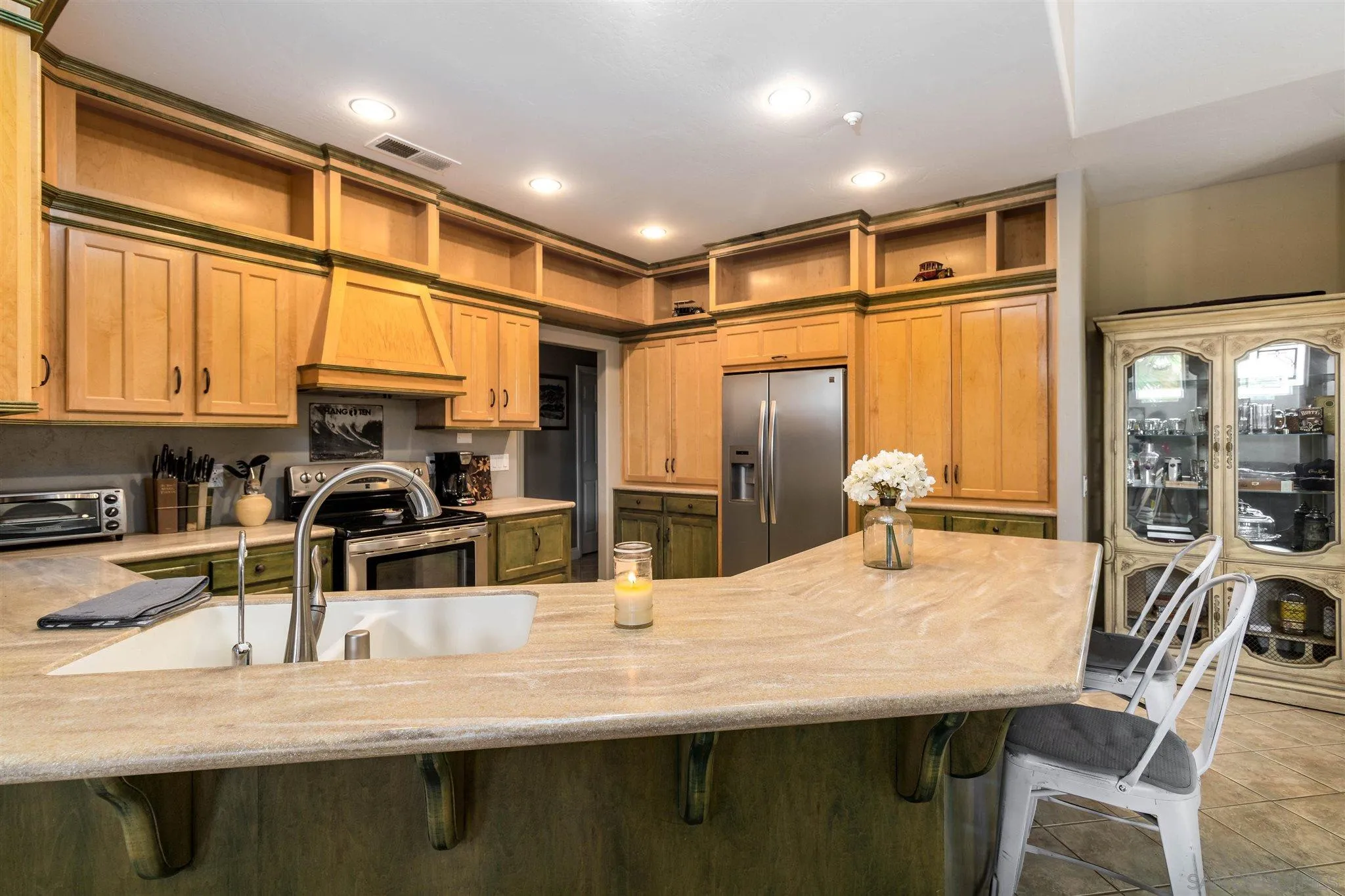 19139 Split Rock Road Ramona, CA 92065 - Photo 6 of 29 a kitchen with stainless steel appliances wooden floor dining table and chairs