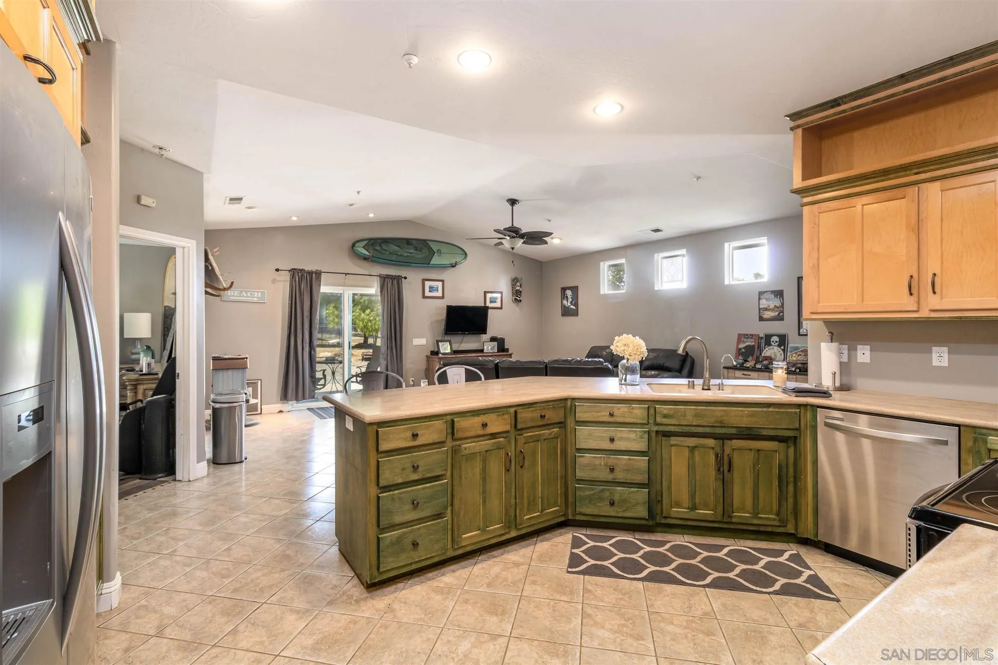 19139 Split Rock Road Ramona, CA 92065 - Photo 8 of 29 a large kitchen with a window and stainless steel appliances