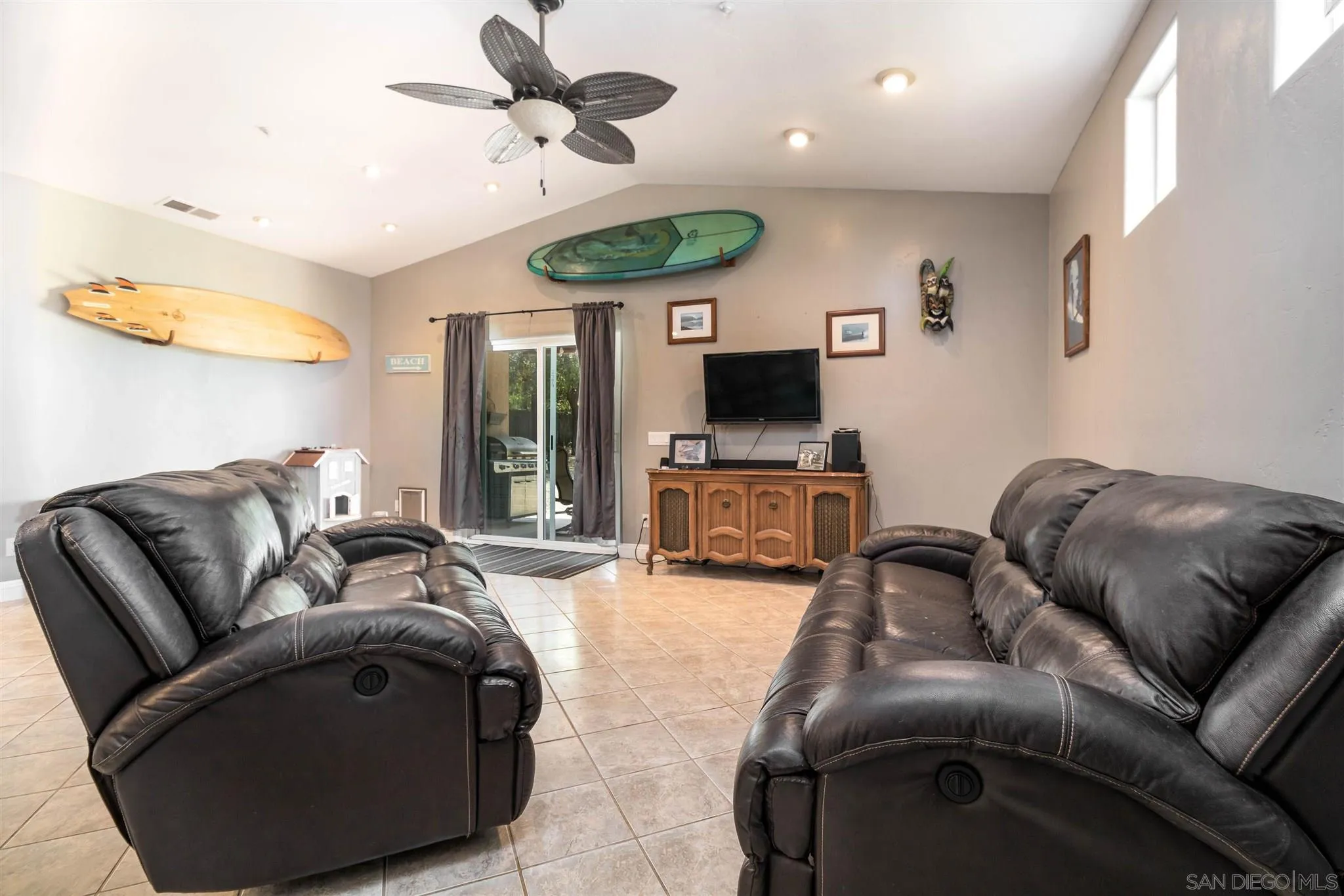 19139 Split Rock Road Ramona, CA 92065 - Photo 10 of 29 a living room with furniture and a flat screen tv