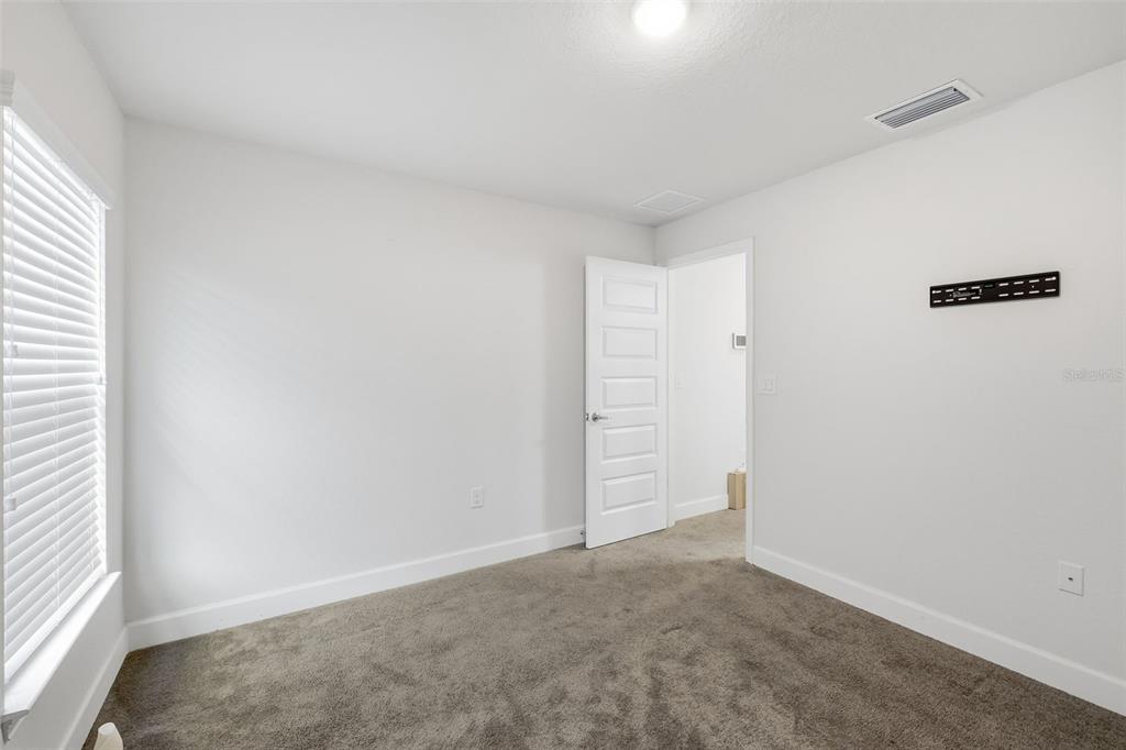 9144 Southeast 47th Court Road Ocala, FL 34480 - Photo 26 of 32 an empty room with an empty space