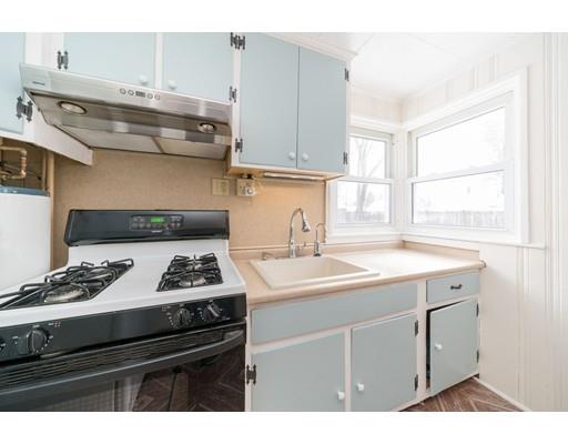 17 Eldridge Street Chicopee, MA 01013 - Photo 11 of 30 a kitchen with appliances cabinets and a sink