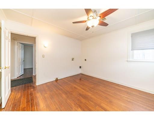 17 Eldridge Street Chicopee, MA 01013 - Photo 16 of 30 a view of an empty room with wooden floor