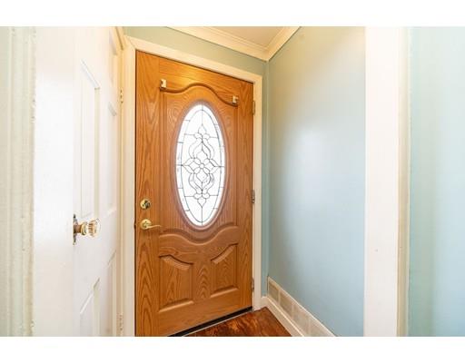 17 Eldridge Street Chicopee, MA 01013 - Photo 2 of 30 a view of a hallway with wooden door