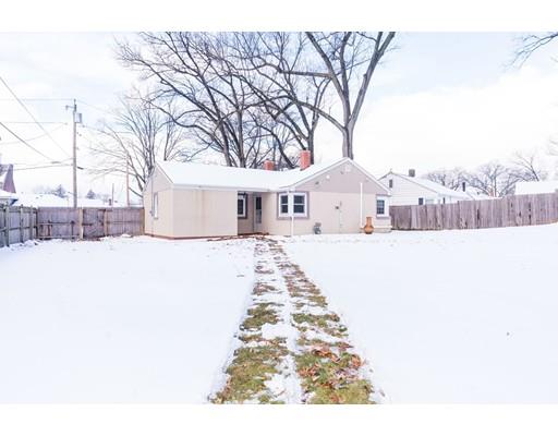 17 Eldridge Street Chicopee, MA 01013 - Photo 22 of 30 a view of a white house with a yard covered in snow