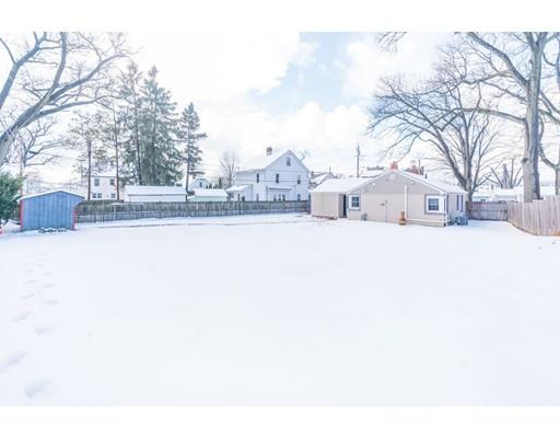 17 Eldridge Street Chicopee, MA 01013 - Photo 25 of 30 a view of a white house with a snow