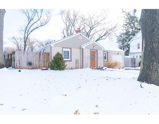 17 Eldridge Street Chicopee, MA 01013 - Photo 30 of 30 a front view of a house with a yard covered in snow