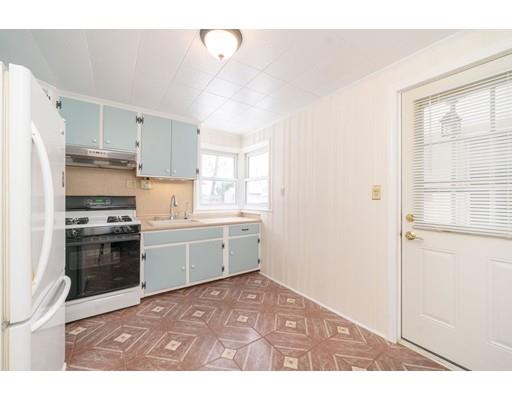 17 Eldridge Street Chicopee, MA 01013 - Photo 7 of 30 a kitchen with a refrigerator stove and sink