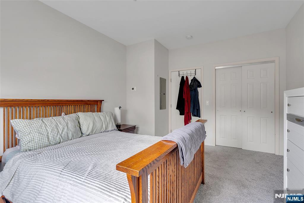 5320 Richmond Road West Milford, NJ 07480 - Photo 15 of 20 a bedroom with a bed and a walk in closet
