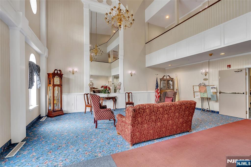 5320 Richmond Road West Milford, NJ 07480 - Photo 17 of 20 a living room with furniture and a chandelier