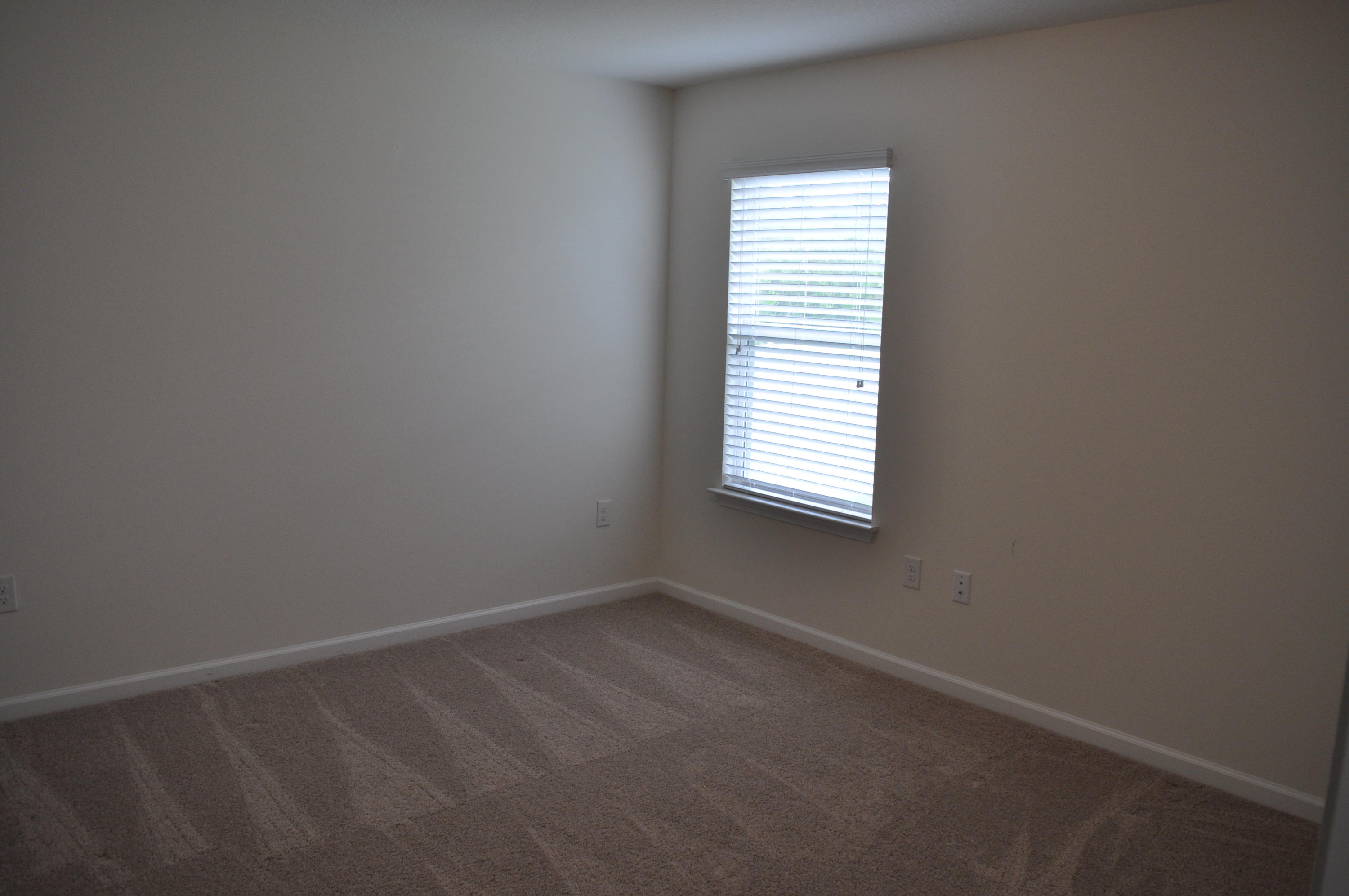 563 Fanny Ann Way Freeport, FL 32439 - Photo 3 of 18 an empty room with a window