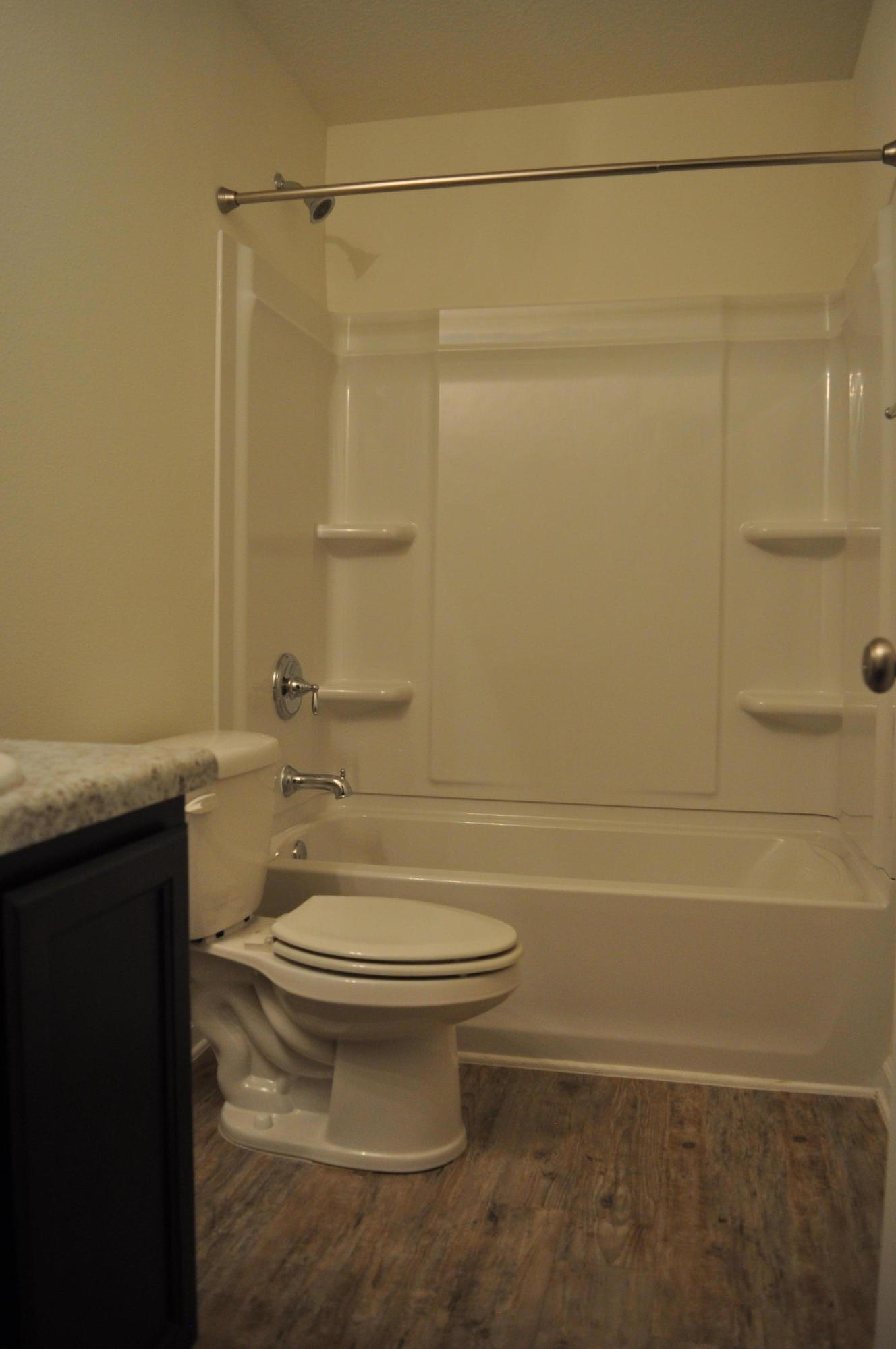 563 Fanny Ann Way Freeport, FL 32439 - Photo 4 of 18 a bathroom with a shower a toilet and sink