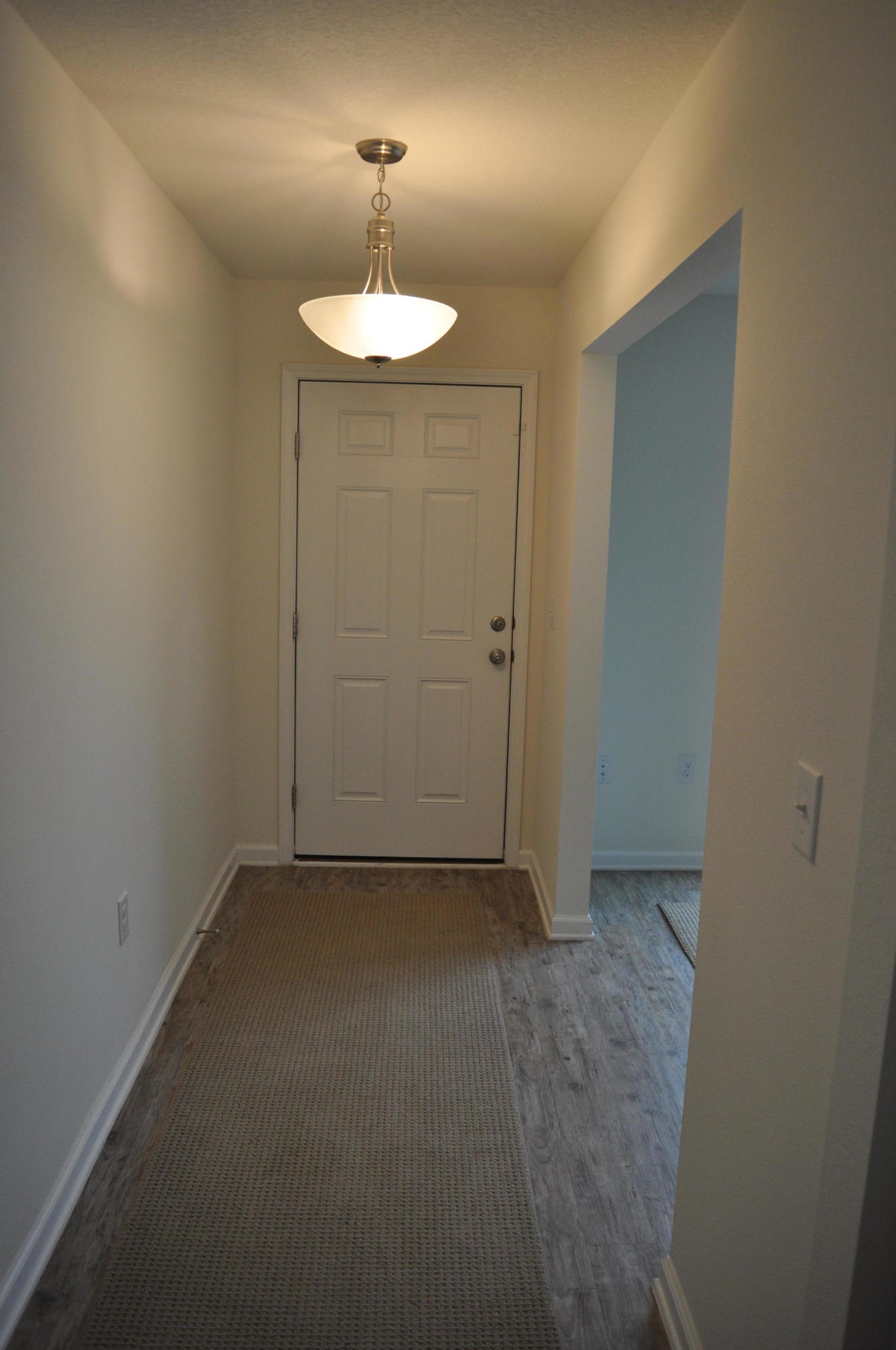 563 Fanny Ann Way Freeport, FL 32439 - Photo 10 of 18 wooden floor in an empty room