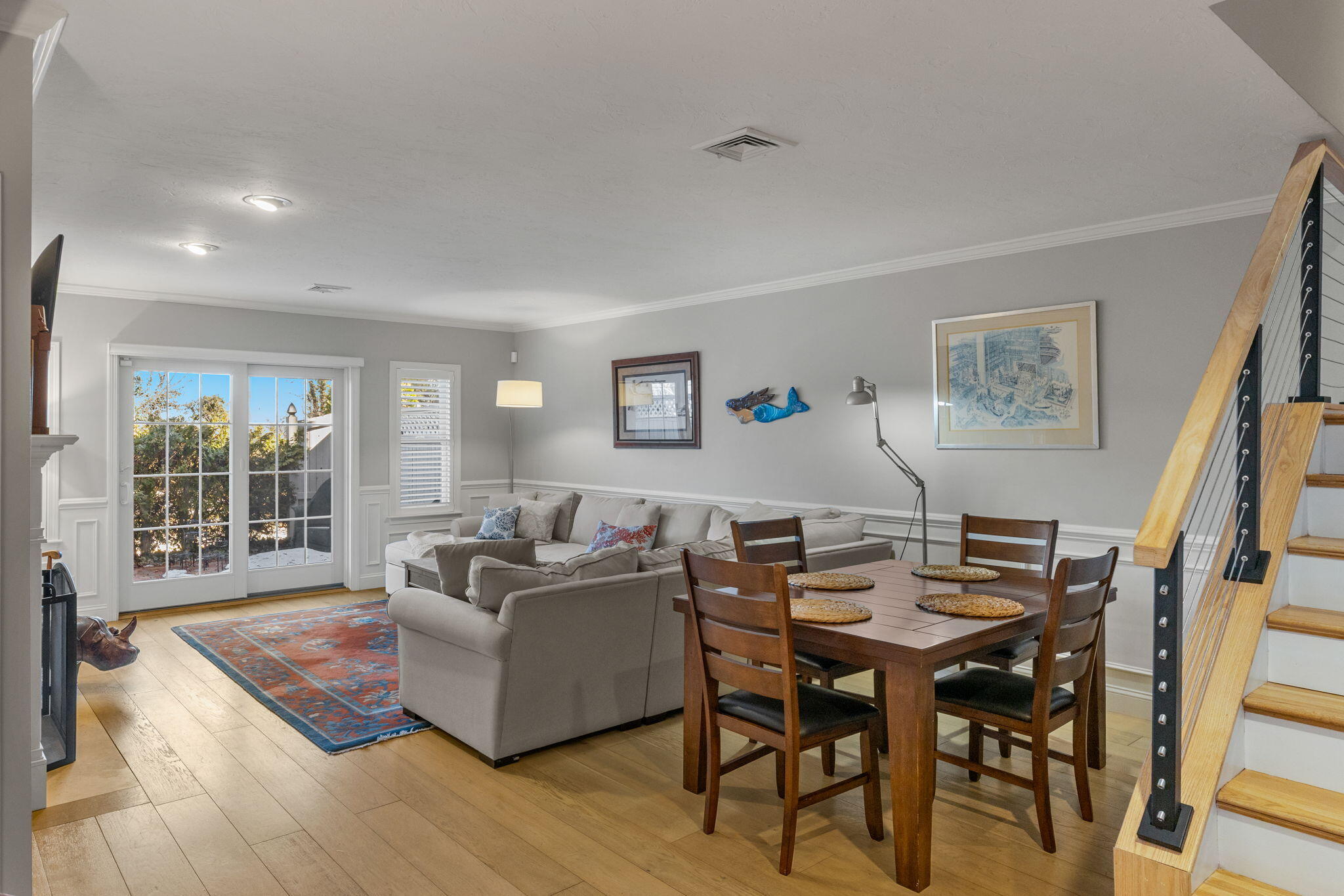 925 Main Street, Unit 3 Cotuit, MA 02635 - Photo 11 of 55 a living room with furniture and a table