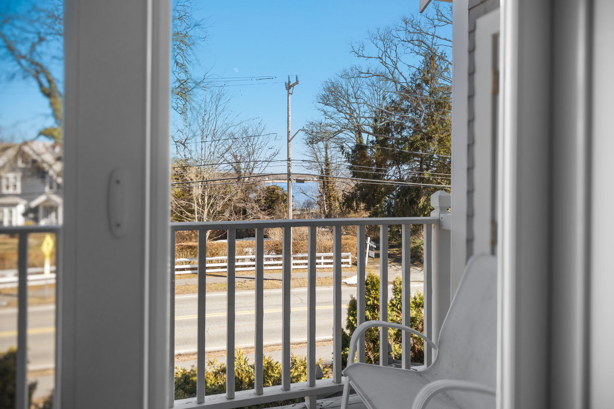 925 Main Street, Unit 3 Cotuit, MA 02635 - Photo 27 of 55 a view of a balcony with wooden floor