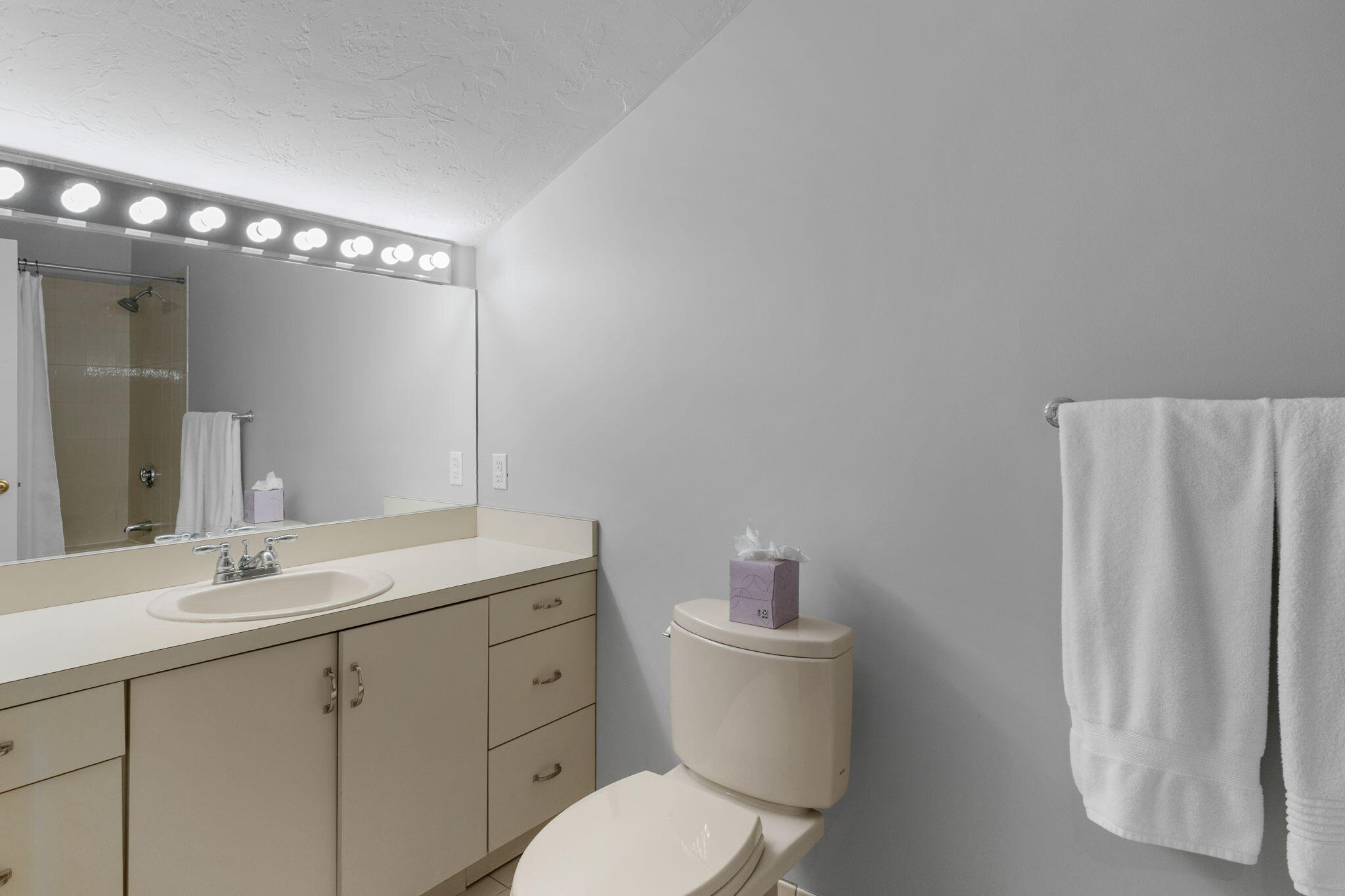 925 Main Street, Unit 3 Cotuit, MA 02635 - Photo 28 of 55 a bathroom with a toilet sink and mirror