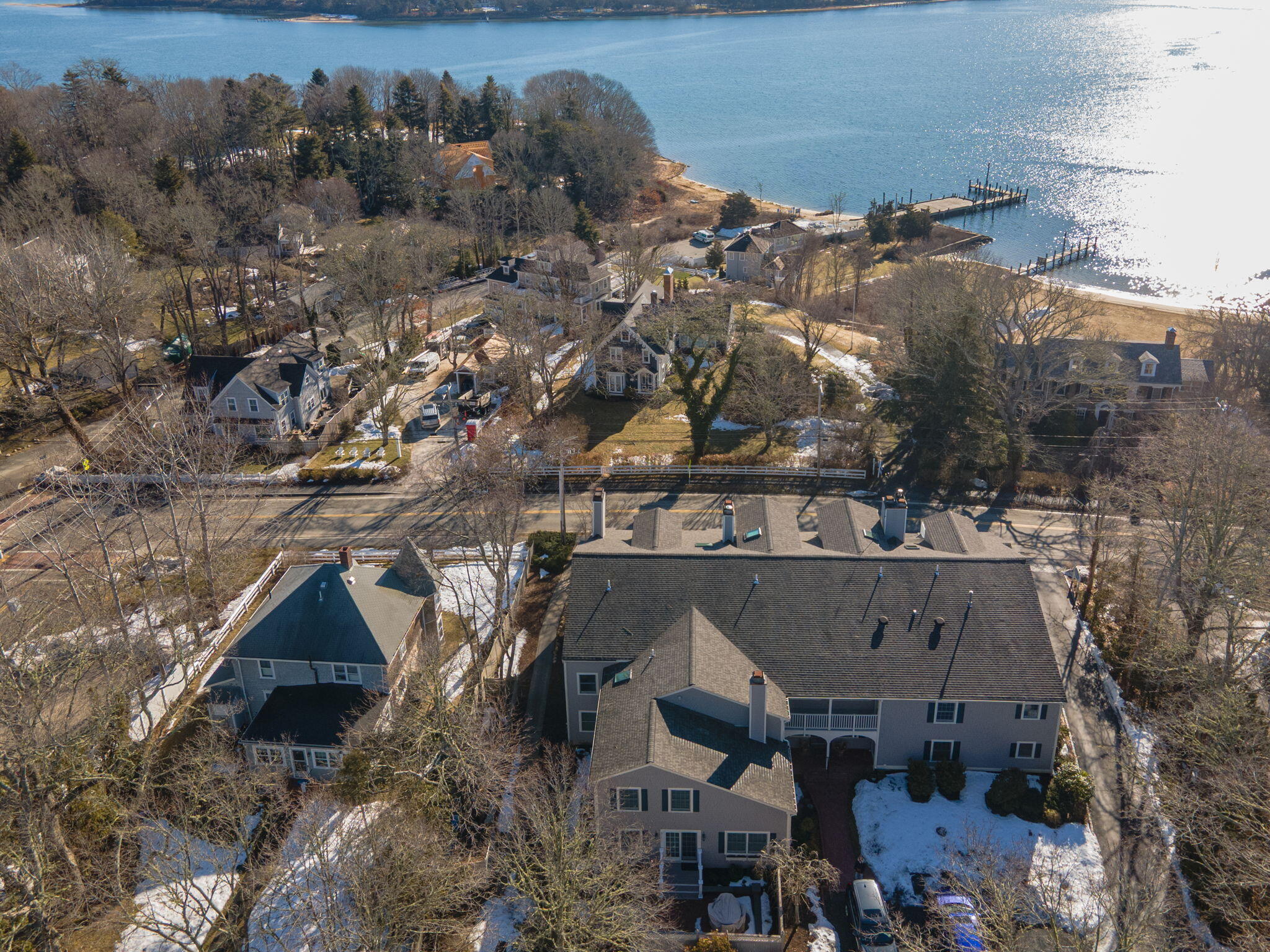 925 Main Street, Unit 3 Cotuit, MA 02635 - Photo 39 of 55 an aerial view of houses with a yard