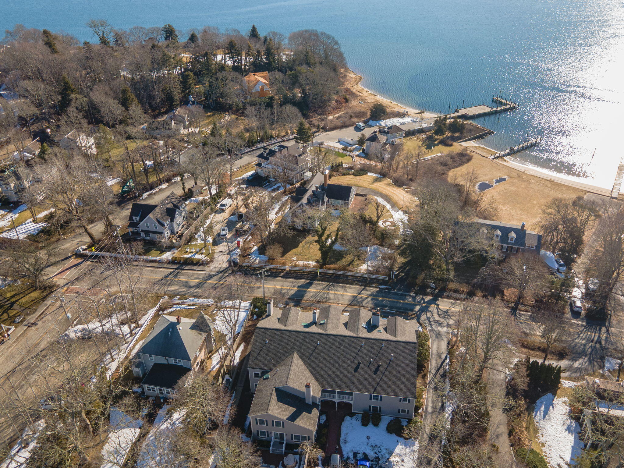 925 Main Street, Unit 3 Cotuit, MA 02635 - Photo 44 of 55 an aerial view of a house with a yard