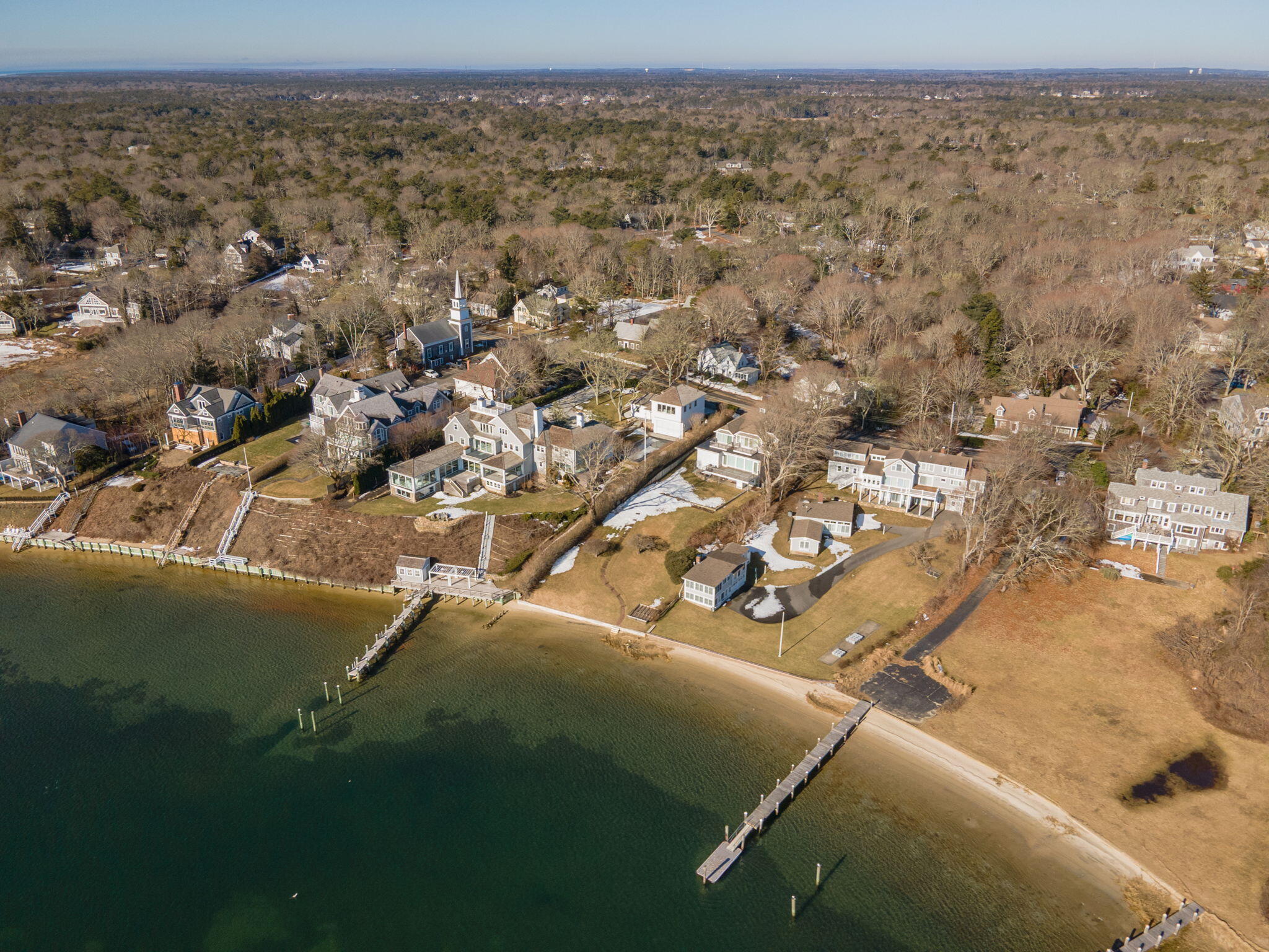925 Main Street, Unit 3 Cotuit, MA 02635 - Photo 46 of 55 an aerial view of residential houses with outdoor space and trees