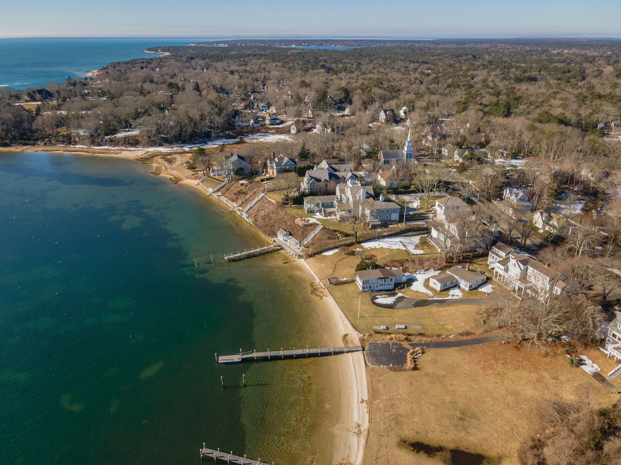 925 Main Street, Unit 3 Cotuit, MA 02635 - Photo 47 of 55 an aerial view of residential houses with outdoor space