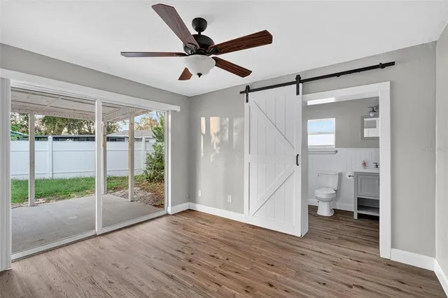 a bathroom with a shower and a toilet