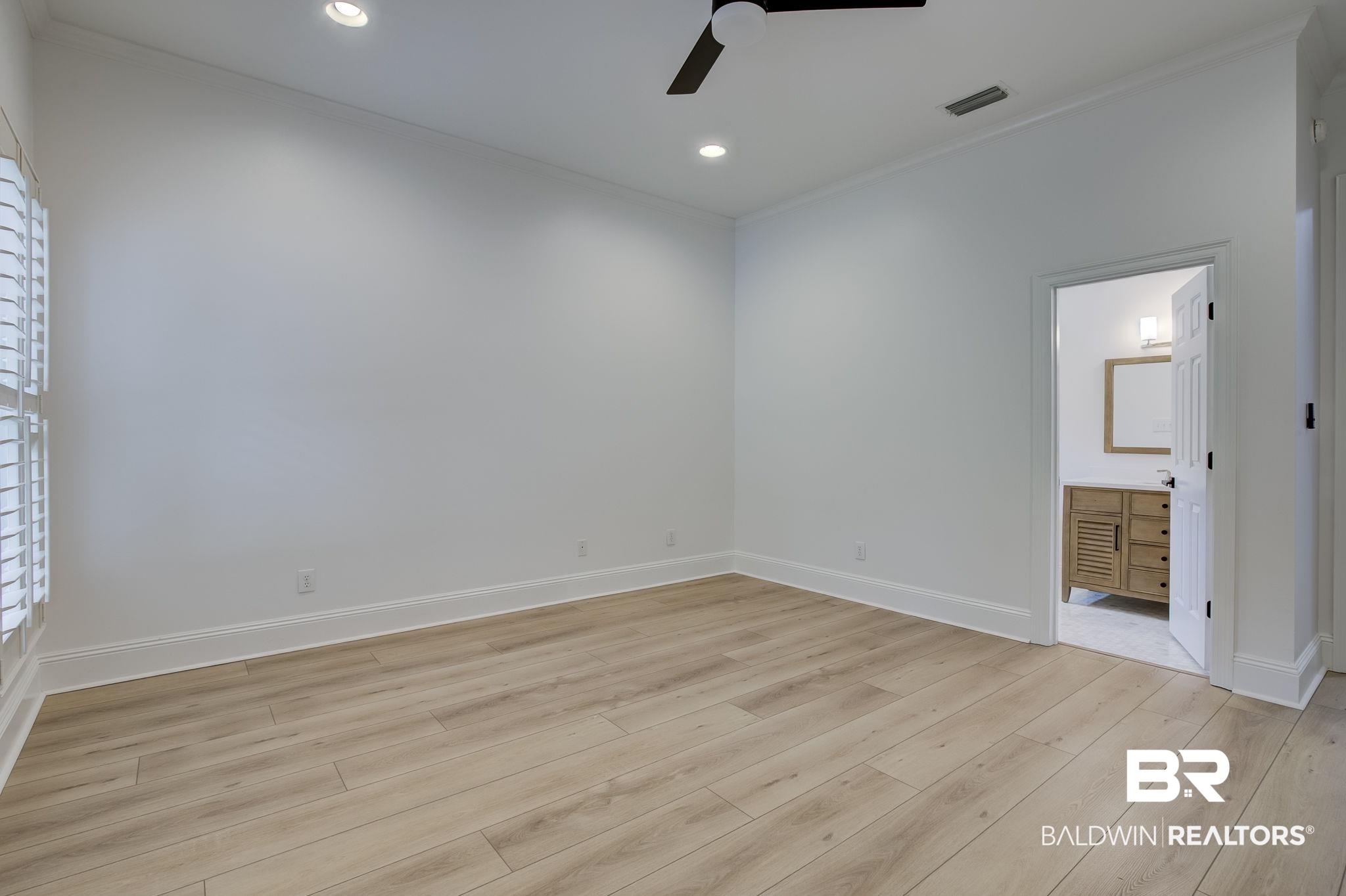 105 High Pines Ridge Fairhope, AL 36532 - Photo 66 of 97 Unfurnished room featuring ceiling fan, ornamental molding, light wood-style floors, baseboards, and recessed lighting