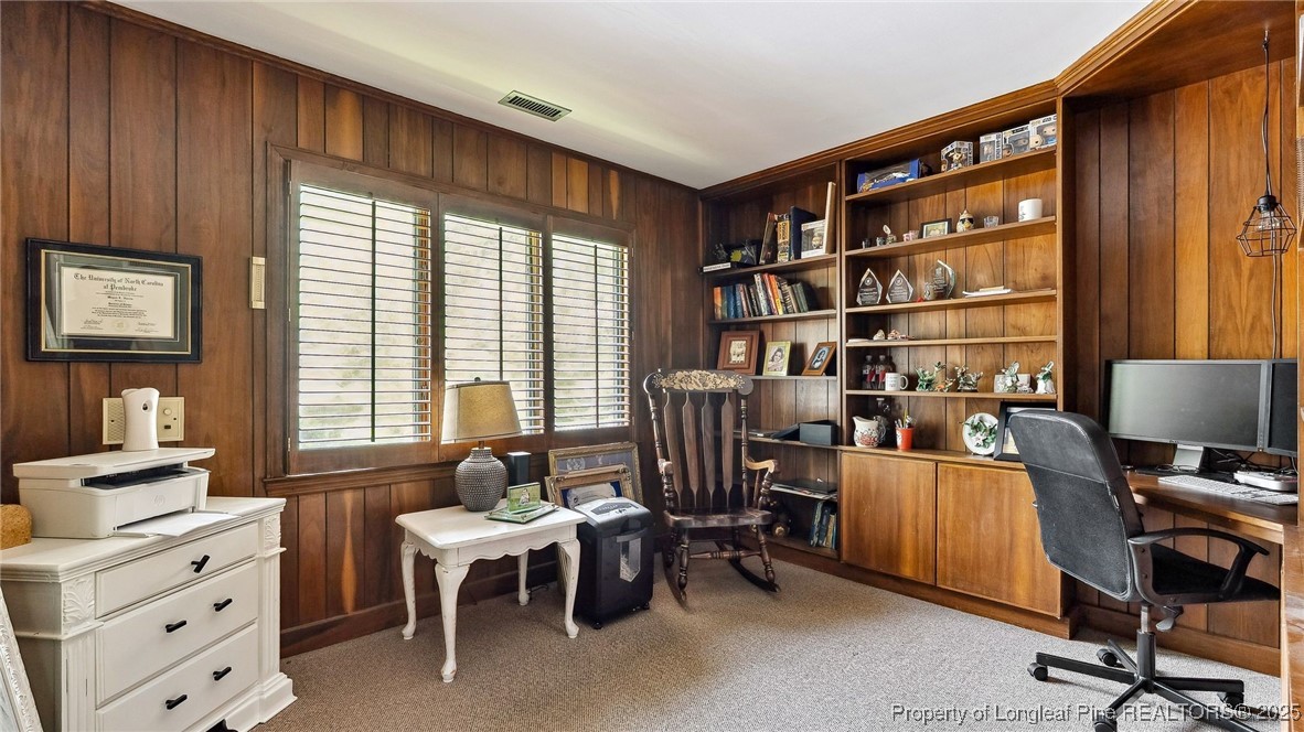 1855 Riverside Boulevard Lumberton, NC 28358 - Photo 30 of 50 a view of a workspace with a window and lounge chair