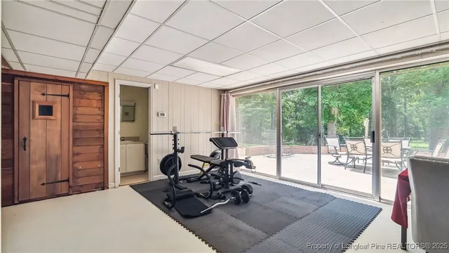 a view of a patio with a table and chairs