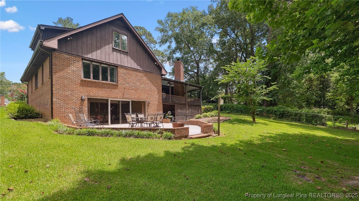 1855 Riverside Boulevard Lumberton, NC 28358 - Photo 44 of 50 a view of a house with a yard and sitting area