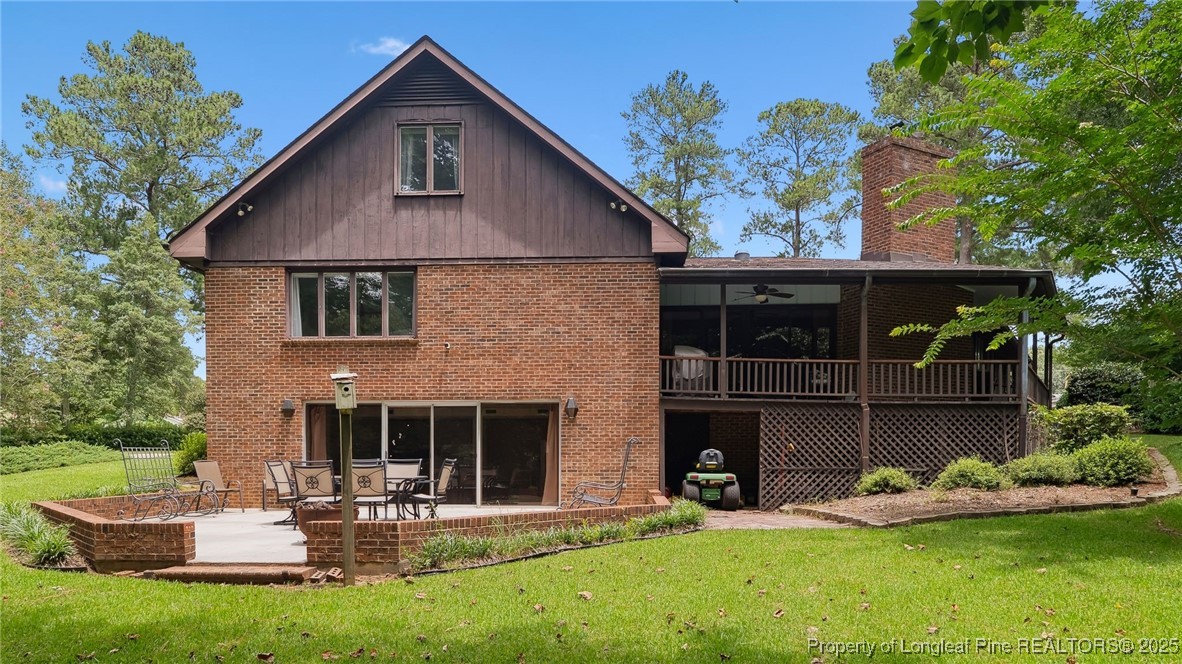 1855 Riverside Boulevard Lumberton, NC 28358 - Photo 45 of 50 a front view of a house with garden