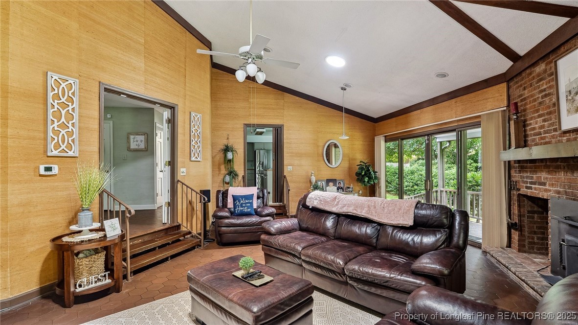 1855 Riverside Boulevard Lumberton, NC 28358 - Photo 8 of 50 a living room with fireplace furniture and a large window
