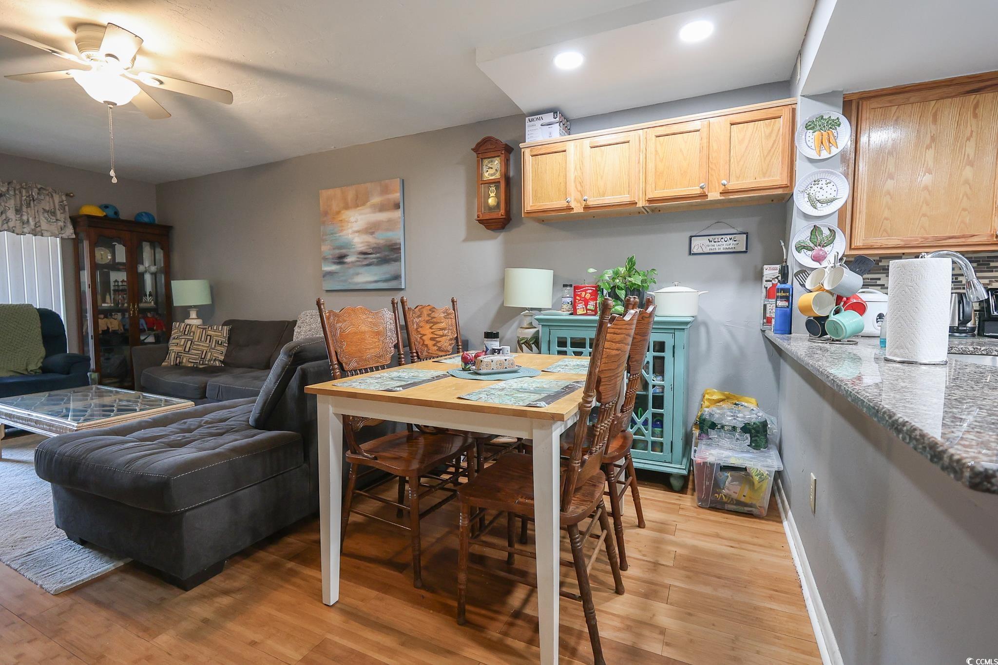 1301 Pridgen Road, Unit 1101 Myrtle Beach, SC 29577 - Photo 11 of 21 Kitchen with a ceiling fan, light stone counters,