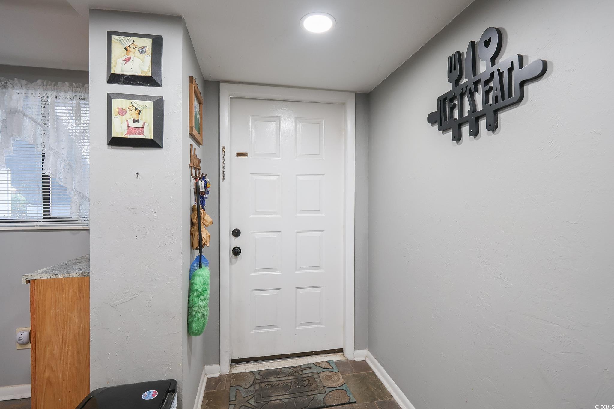 1301 Pridgen Road, Unit 1101 Myrtle Beach, SC 29577 - Photo 17 of 21 Doorway with baseboards