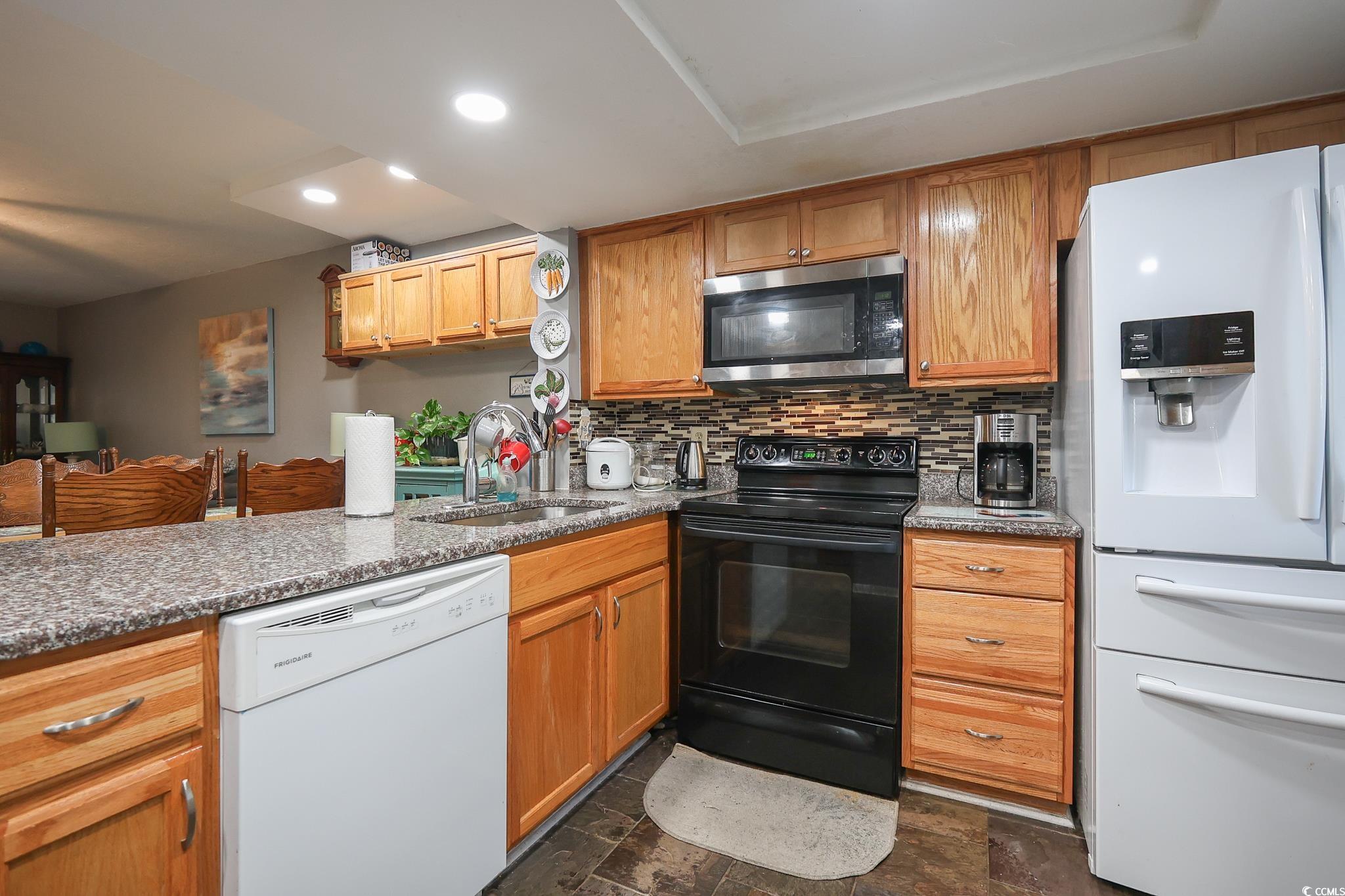 1301 Pridgen Road, Unit 1101 Myrtle Beach, SC 29577 - Photo 4 of 21 Kitchen with tasteful backsplash, recessed lightin