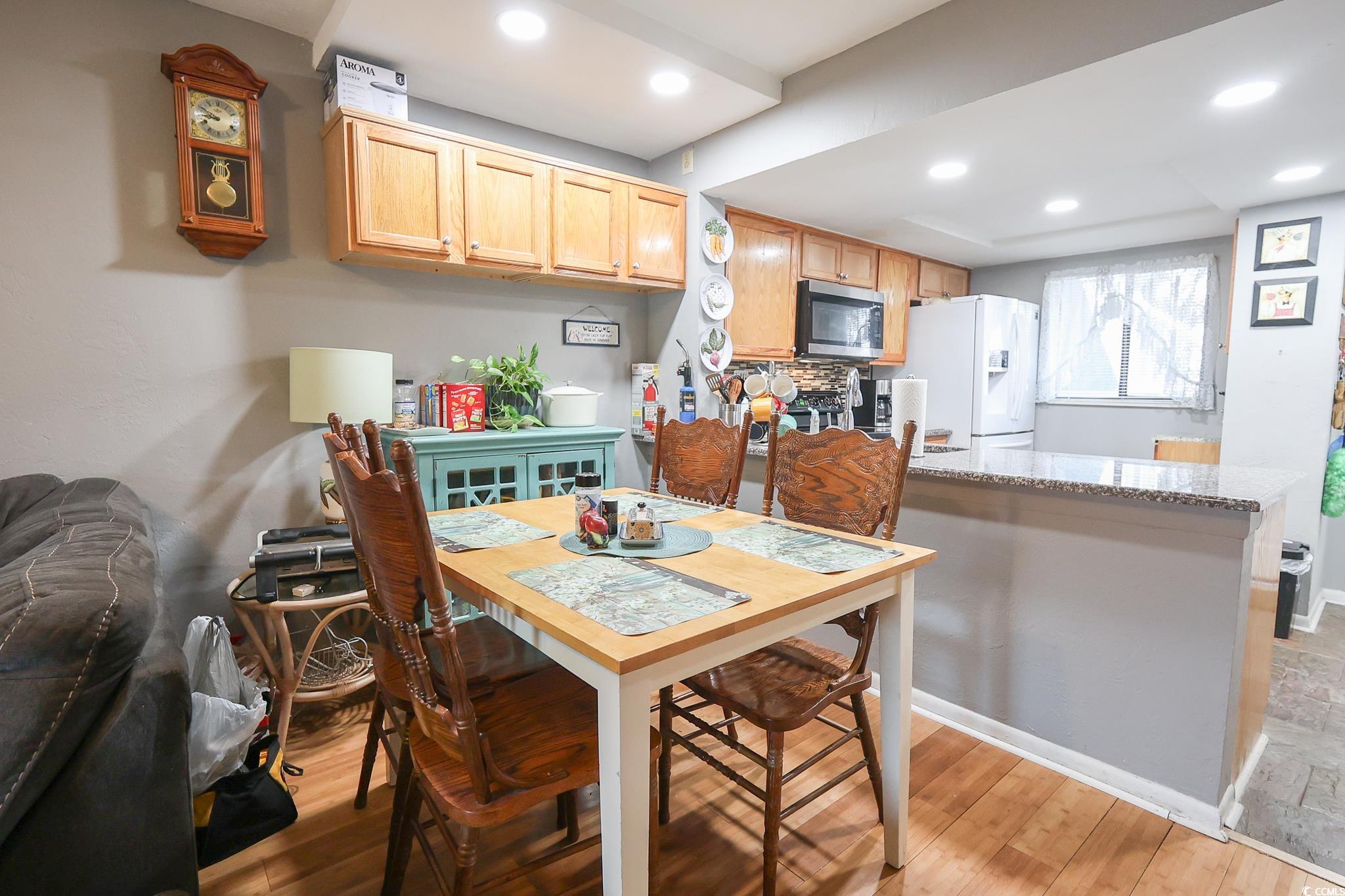 1301 Pridgen Road, Unit 1101 Myrtle Beach, SC 29577 - Photo 10 of 21 Kitchen with white fridge with ice dispenser, rece